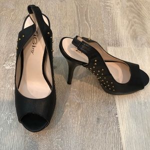 Ziginy , black platform heels.